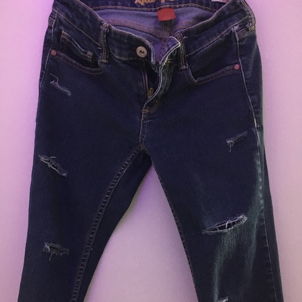 Arizona Jeans. Dark blue with rips for style.